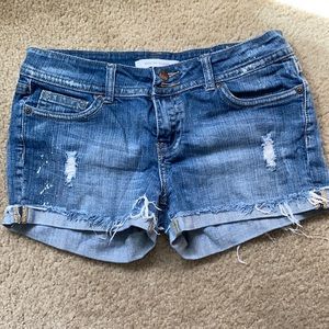 Denim shorts with distressed details